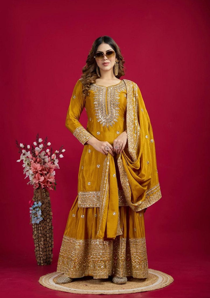 Embroidered Chenderi Mustard Stitched Suit - Indya