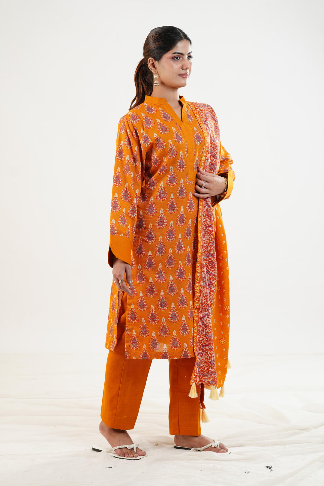 Printed Khaddar Orange Stitched Suit - Nishat
