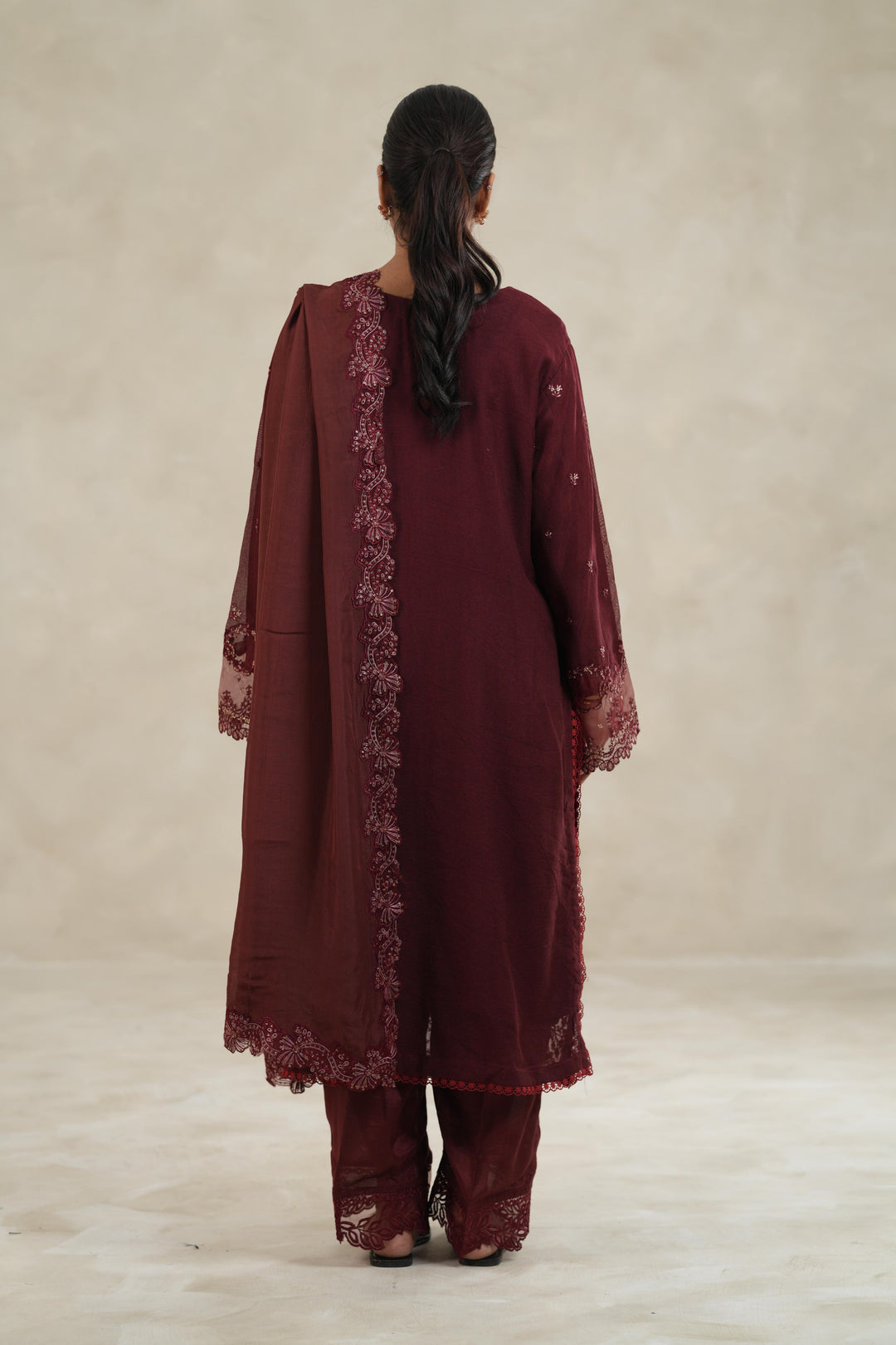 Embroidered Khaddi Net Maroon Stitched Suit - Azure