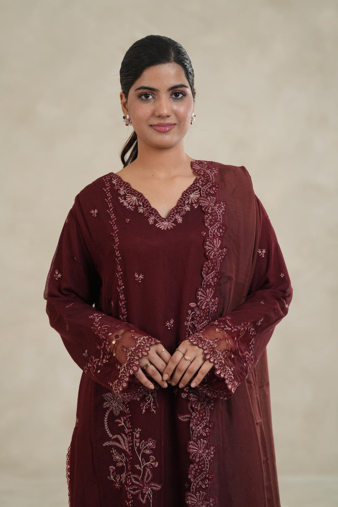 Embroidered Khaddi Net Maroon Stitched Suit - Azure